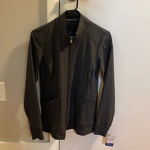 Never worn before pewter XXS scrub jacket, tag still in place